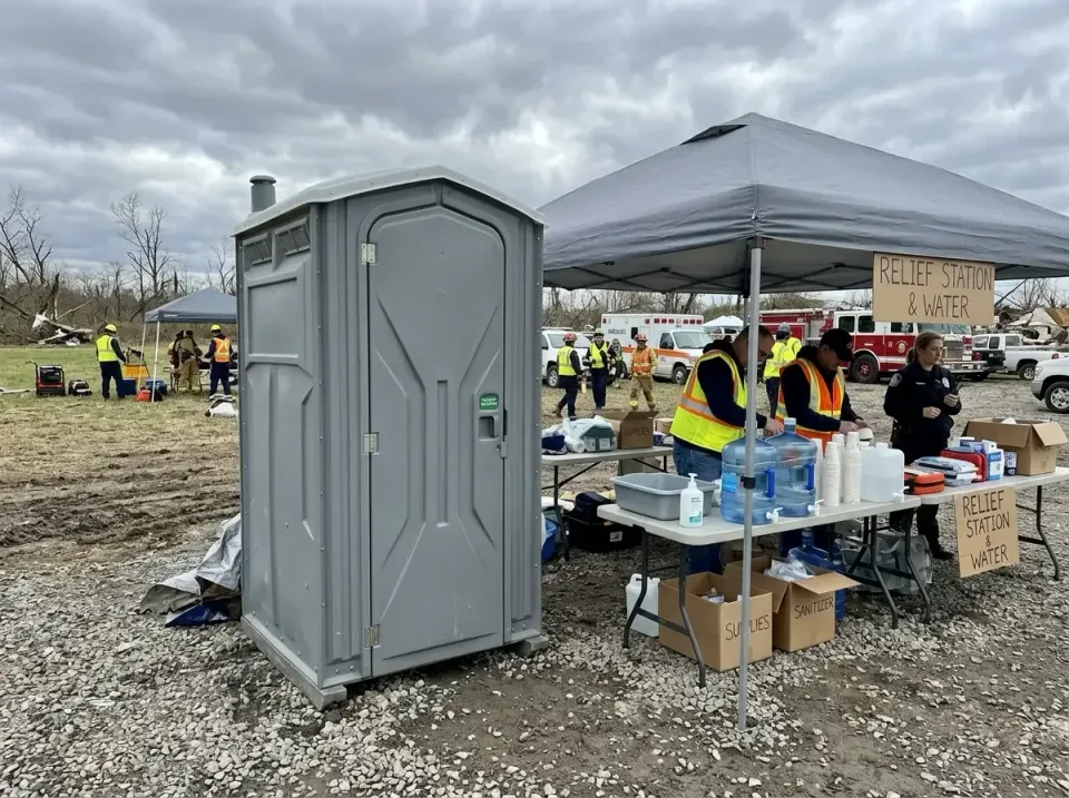 Porta Potty — Emergency Response Site — Porta Potty, Canopy Tent, Folding Table, Emergency Response Site, Toilet and Dumpste…